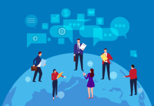 journalists atop a globe under speech bubbles