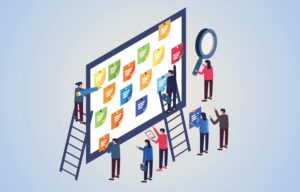 sticky notes on a whiteboard, placed there by tiny figures on ladders