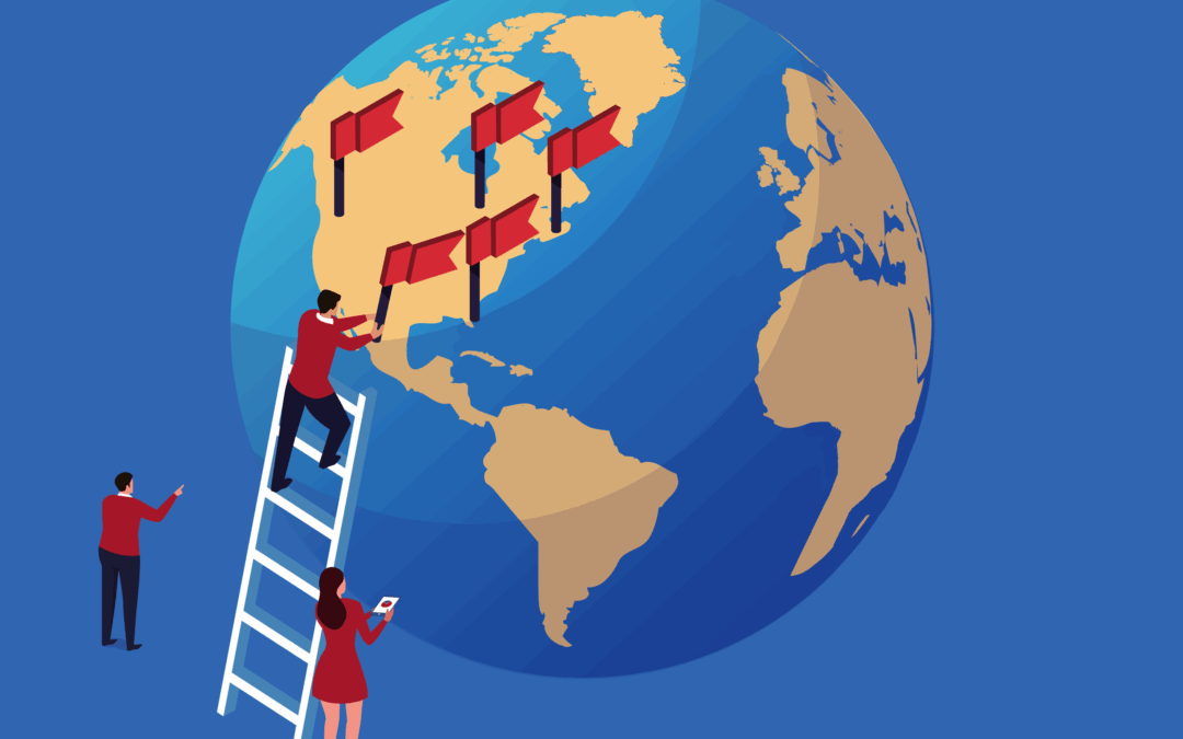 man on ladder next to giant globe placing fifth flag on a US city