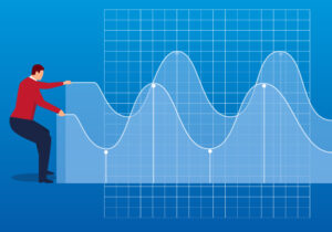 businessperson pulling two line charts, one in each hand